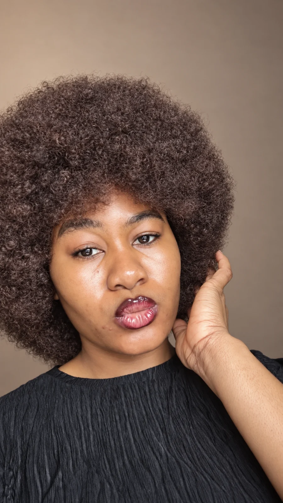 Close portrait of Cynthia looking directly into the camera